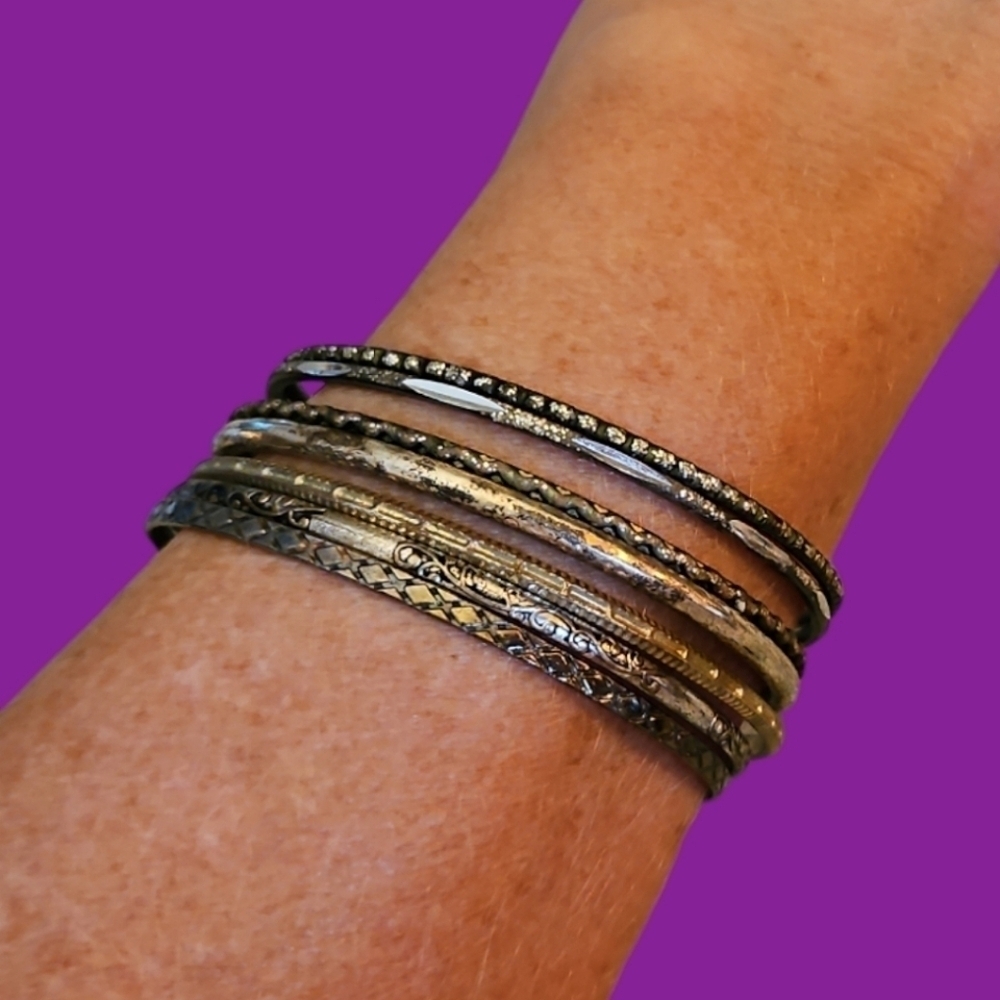 3/$30 Set of Seven Thin Stackable Metal Bangle Bracelets